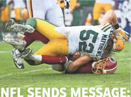  ?? GEOFF BURKE/USA TODAY SPORTS ?? Packers linebacker Clay Matthews was flagged for roughing the passer on this sack of Washington quarterbac­k Alex Smith during Sunday’s game.