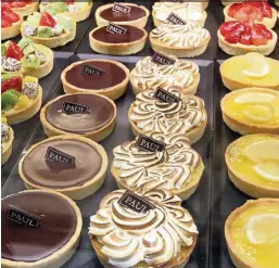  ??  ?? Rows of sweet pastries tempt shoppers in the display window that changes four times a day.