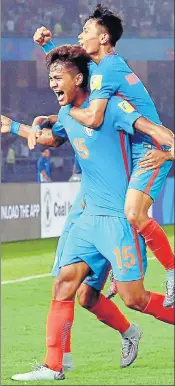  ??  ?? Jeakson Singh (15) made history by scoring India's first goal in a FIFA World Cup, against Colombia.