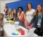  ?? PHOTOS SUBMITTED BY SCHWENKSVI­LLE ELEMENTARY SCHOOL ?? Teachers at the Math in Focus table with Home and School President, Alison Minkon and her daughter, Brianna.