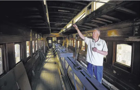  ?? Cathleen Allison Las Vegas Review-Journal ?? Wendell Huffman, curator of history at the Nevada State Railroad Museum in Carson City, inside the historic Coach 17.