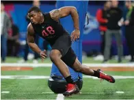 ?? The Associated Press ?? ■ Georgia defensive lineman Travon Walker runs a drill during the NFL combine March 5 in Indianapol­is.