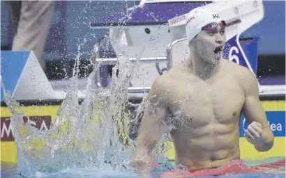 ?? Picture: EPA ?? MAKING A SPLASH. Yang Sun of China celebrates after winning in the men’s 400m freestyle at the Duna Arena during the Fina World Championsh­ips in Budapest yesterday.