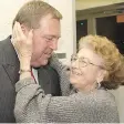  ?? GREG PENDER ?? Don Atchison takes a hug from mother Martha Atchison at his campaign office after his first win as mayor in 2003.