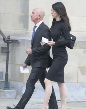 ?? (Photo: AFP) ?? WASHINGTON, United States — In this file photo taken on September 1, 2018 Amazon CEO Jeff Bezos and his wife Mackenzie arrive at the Washington Cathedral to attend the service for late Senator John Mccain in Washington DC. -
