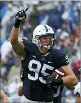  ?? ASSOCIATED PRESS FILE ?? In this Sept. 12, 2015, file photo, Penn State defensive end Carl Nassib (95) celebrates an intercepti­on during against Buffalo in State College.