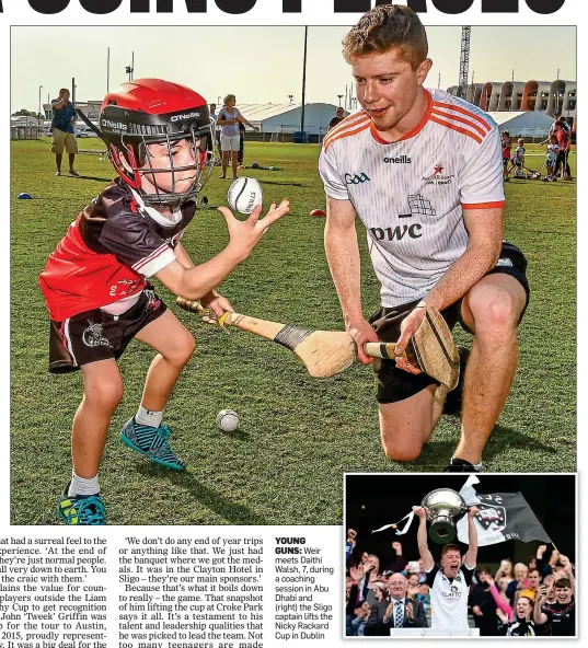  ??  ?? YOUNG
GUNS: Weir meets Daithi Walsh, 7, during a coaching session in Abu Dhabi and (right) the Sligo captain lifts the Nicky Rackard Cup in Dublin