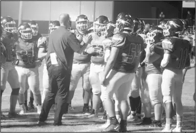  ?? Photo by Gerren Smith ?? STAYING MOTIVATED: Poyen football head coach Vick Barrett keeps the Indians motivated in attack mode during a timeout of action. The Indians are 6-0 overall and 1-0 in conference going into week 7 of Arkansas High School football.