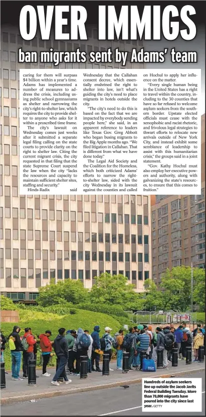  ?? GETTY ?? Hundreds of asylum seekers line up outside the Jacob Javits Federal Building Tuesday. More than 70,000 migrants have poured into the city since last year.