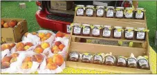  ?? Photograph submitted ?? The Pea Ridge Farmers Market will feature Vanzant peaches again this week, as well as peach cobbler jam, cucumbers, tomatoes, peppers, baked goods and more. The market will be open for the first time on Thursday this season from 10 a.m. to 4 p.m. and...