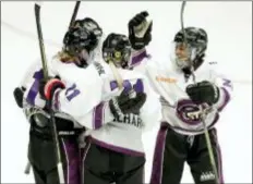  ?? MARK HUMPHREY — THE ASSOCIATED PRESS ?? Team Szabados forward Audra Richards, center, is congratula­ted after scoring a goal against Team Stecklein in the NWHL All-Star Hockey Game Sunday in Nashville, Tenn.