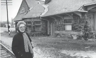  ?? FILES ?? Alvira Wigle, pictured in front of the Kingsville’s old railway station in 1982, helped save the old Hiram Walker station and was a champion of heritage preservati­on. She died April 15 at the age of 89.