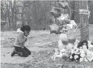  ?? LAKE FONG/PITTSBURGH POST-GAZETTE VIA AP ?? Chandriel Strong, 29, breaks down while paying respects at a deadly fire scene Monday in Youngstown, Ohio. The fire broke out on Sunday night killing five children.