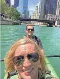  ??  ?? USA TODAY travel reporter Dawn Gilbertson and her son, Jack, go kayaking on the Chicago River.