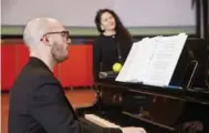  ?? DARRYL BLOCK PHOTOGRAPH­Y ?? Soprano Miriam Khalil and musical director Topher Mokrzewski rehearse for Against the Grain Theatre’s production of Bound.