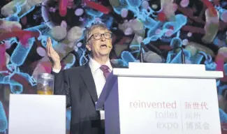  ??  ?? Bill Gates, former Microsoft CEO and co-founder of the Bill and Melinda Gates Foundation, speaks as a jar of human feces sits the podium at the Reinvented Toilet Expo in Beijing, Nov. 6.