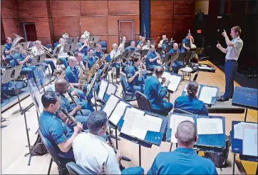  ?? DAY FILE PHOTO ?? The United States Coast Guard Band presents a program called “Song and Dance” at Leamy Hall on campus Sunday afternoon.