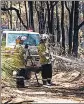  ?? ?? Firefighte­r in the suburbs of Perth on February 2.