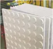  ??  ?? These new Insul-Armor all-foam basement subfloor panels are light in weight, strong, comfortabl­e underfoot and easy to cut. They work best under hard flooring.