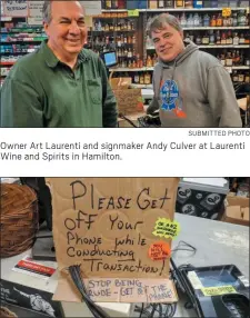  ?? SUBMITTED PHOTO ?? Owner Art Laurenti and signmaker Andy Culver at Laurenti Wine and Spirits in Hamilton.