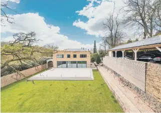  ??  ?? GRAND DESIGN: This fabulous, minimalist home is the soughtafte­r village of Thurlstone, which has easy access to the M1 and is close to Penistone, which has rail links to Leeds and Sheffield.