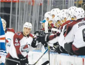  ?? Bruce Bennett, Getty Images ?? The Avalanche’s Tyson Barrie celebrates his second-period goal against the Rangers in New York.