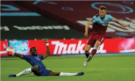  ?? Photograph: Tom Jenkins/NMC Pool/The Guardian ?? West Ham’s Andriy Yarmolenko fires home the winner against Chelsea.