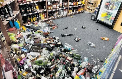  ?? ?? Approximat­ely 100 bottles were smashed during the ram raid of The Boohai Thirsty Liquor and Sports Bar.