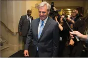  ?? Associated Press ?? House Majority Leader of Kevin McCarthy of Bakersfiel­d walks out of the nomination vote meeting on Capitol Hill in Washington on Thursday.