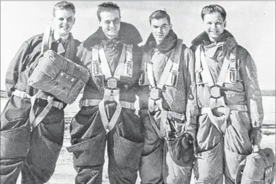  ?? SUBMITTED PHOTOS/RANNIE GILLIS ?? Rannie MacLean (second right) and fellow aircrew are shown days before their final mission.