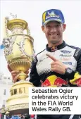  ??  ?? Sebastien Ogier celebrates victory in the FIA World Wales Rally GB.