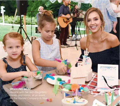  ??  ?? WORKING MUM Jessica with her two daughters, Haven and Honor, at an event for the Honest Company in New York