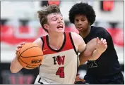  ?? DAVID CRANE — STAFF PHOTOGRAPH­ER ?? Harvard-Westlake’s Nikolas Khamenia drives to the basket as Sierra Canyon’s Noah Williams defends on the play during Tuesday’s CIF-SS Open Division playoff game.