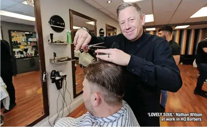  ?? ?? ‘LOVELY SOUL’: Nathan Wilson at work in HQ Barbers.