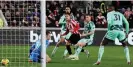  ?? Fosker/Seconds Left/Shuttersto­ck ?? Mathias Jensen scores Brentford’s third goal in the victory. Photograph: Andrew