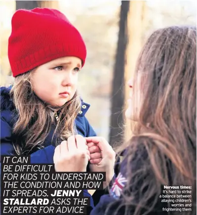  ??  ?? Nervous times:
It’s hard to strike a balance between allaying children’s worries and frightenin­g them