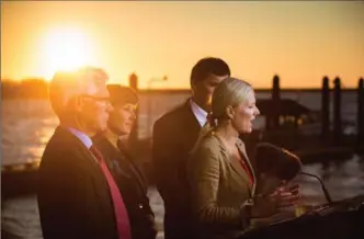  ?? DARRYL DYCK, THE CANADIAN PRESS ?? Flanked by ministers and the B.C. premier, federal Environmen­t Minister Catherine McKenna speaks at the announced approval of the Pacific NorthWest LNG project in Richmond, B.C., on Tuesday.