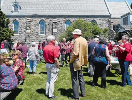  ?? PHOTOS BY SARAH GORDON/THE DAY ?? Parishione­rs gather for a celebratio­n on the lawn outside Calvary Episcopal Church in Stonington on Sunday. The church is celebratin­g its 175th anniversar­y this year.