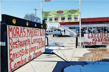  ?? [PHOTO BY JIM BECKEL, THE OKLAHOMAN] ?? Mora’s Market is on Main Street in Guymon.