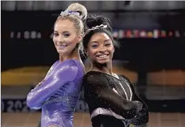  ?? Gregory Bull Associated Press ?? SIMONE BILES, right, and U.S. gymnastics teammate MyKayla Skinner are contending at age 24 in a sport typically centered on teenage athletes.