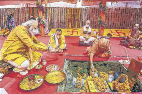  ?? PTI ?? Prime Minister Narendra Modi, RSS chief Mohan Bhagwat and UP governor Anandiben Patel at the bhoomi pujan in Ayodhya on Wednesday.