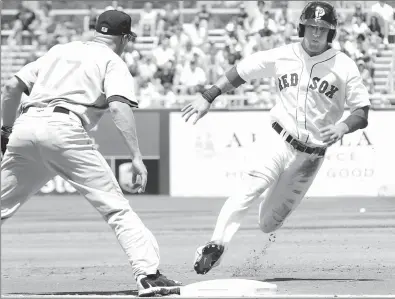  ?? File photo ?? Josh Reddick, right, seen here playing for the PawSox seven years ago, helped end the Red Sox season Monday with an eighth-inning RBI single off of Craig Kimbrel to lead the Astros to a 5-4 win. The Astros claimed the ALDS 3-1.