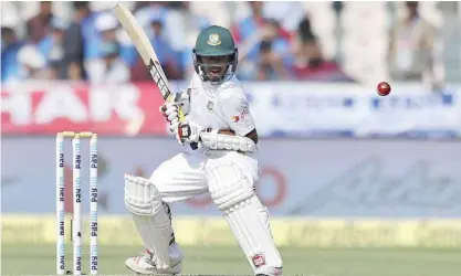  ??  ?? HYDERABAD: Bangladesh’s Mehedi Hasan bats during the third day of the cricket Test match against India in Hyderabad, India, yesterday. —AP