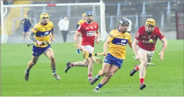  ?? (Pic: George Hatchell) ?? Cork and Castlelyon­s player Niall O’Leary in a race for possession with Clare’s David Reidy in the Allianz Hurling League at Páirc Ui Chaoimh last weekend.