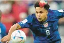  ?? ABBIE PARR/AP ?? Weston McKennie of the United States controls the ball during the World Cup group B soccer match against England. The U.S. will face Iran 2 p.m. Tuesday.