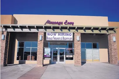  ??  ?? ROBERTO E. ROSALES/JOURNAL This Massage Envy franchise near Paseo del Norte and Ventura NE is advertisin­g for employees.