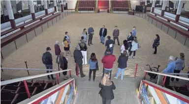  ?? PHOTOS BY NICK OZA/THE REPUBLIC ?? Neighbors, community activists and architects tour the State Fairground­s cattle barns.