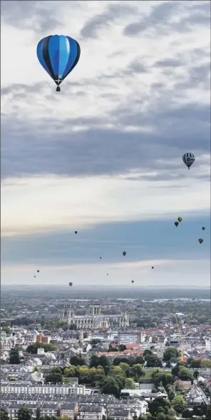  ?? PICTURE: JAMES HARDISTY. ?? UP AND AWAY: Hot air balloons over York as part of the city’s first Balloon Fiesta.