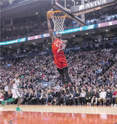  ?? CHRIS YOUNG / THE CANADIAN PRESS ?? Raptors forward Pascal Siakam, seen dunking against the Boston Celtics on Tuesday, has been one of the impact players on Toronto’s second unit. “Our job is to not have any drop- off when we sub,” Fred VanVleet said.