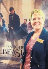  ?? ROSALIE RAYBURN/JOURNAL ?? Sandy Dodson, director of Premiere Cinemas movie theater in Rio Rancho, says her husband and three children are used to her working the holidays because it just goes with the job. When her kids were young she used to sneak home late at night to play...